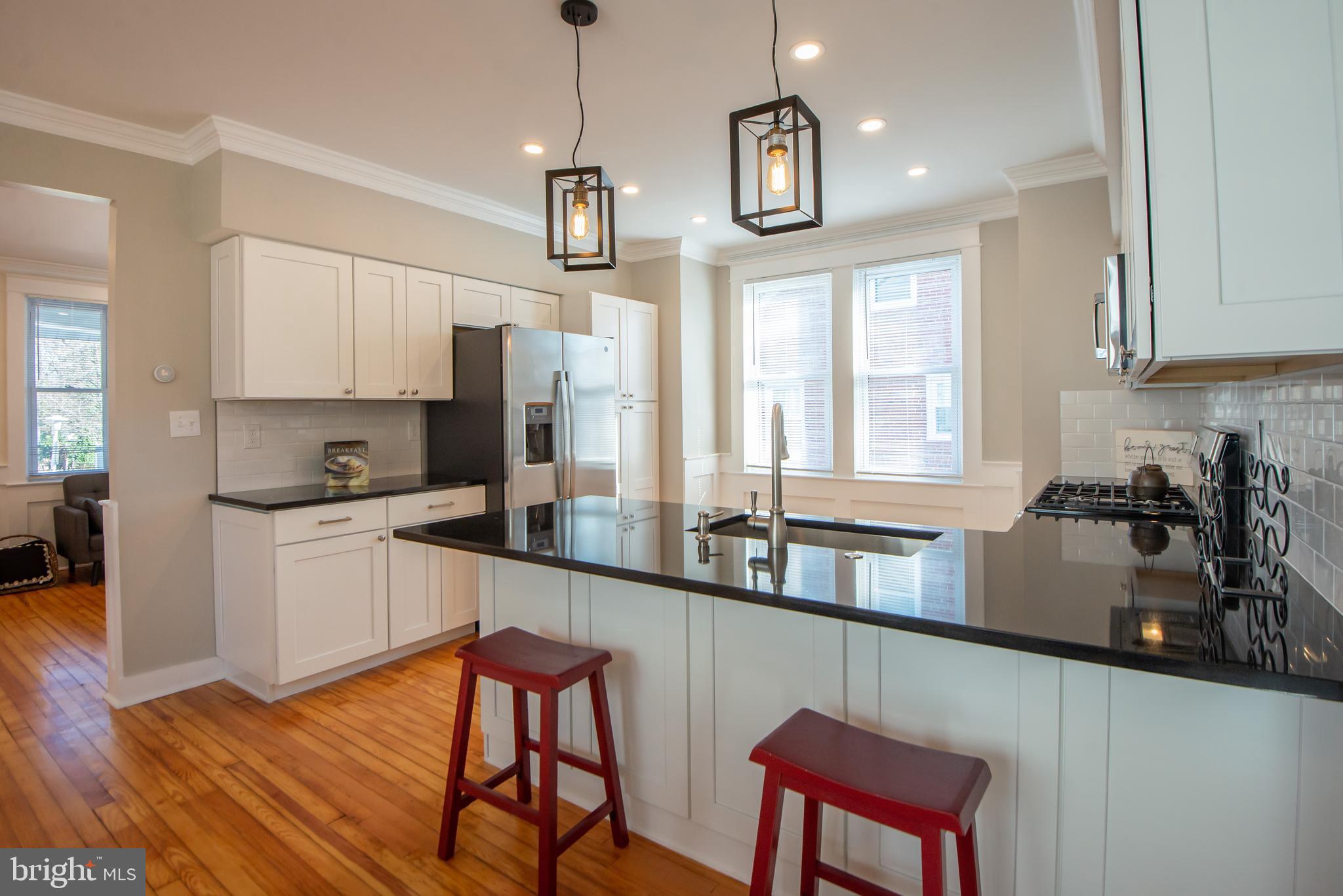 3323 Rueckert Avenue Baltimore, MD 21214 - Photo 11 of 27 Entertain while you cook with eat in kitchen