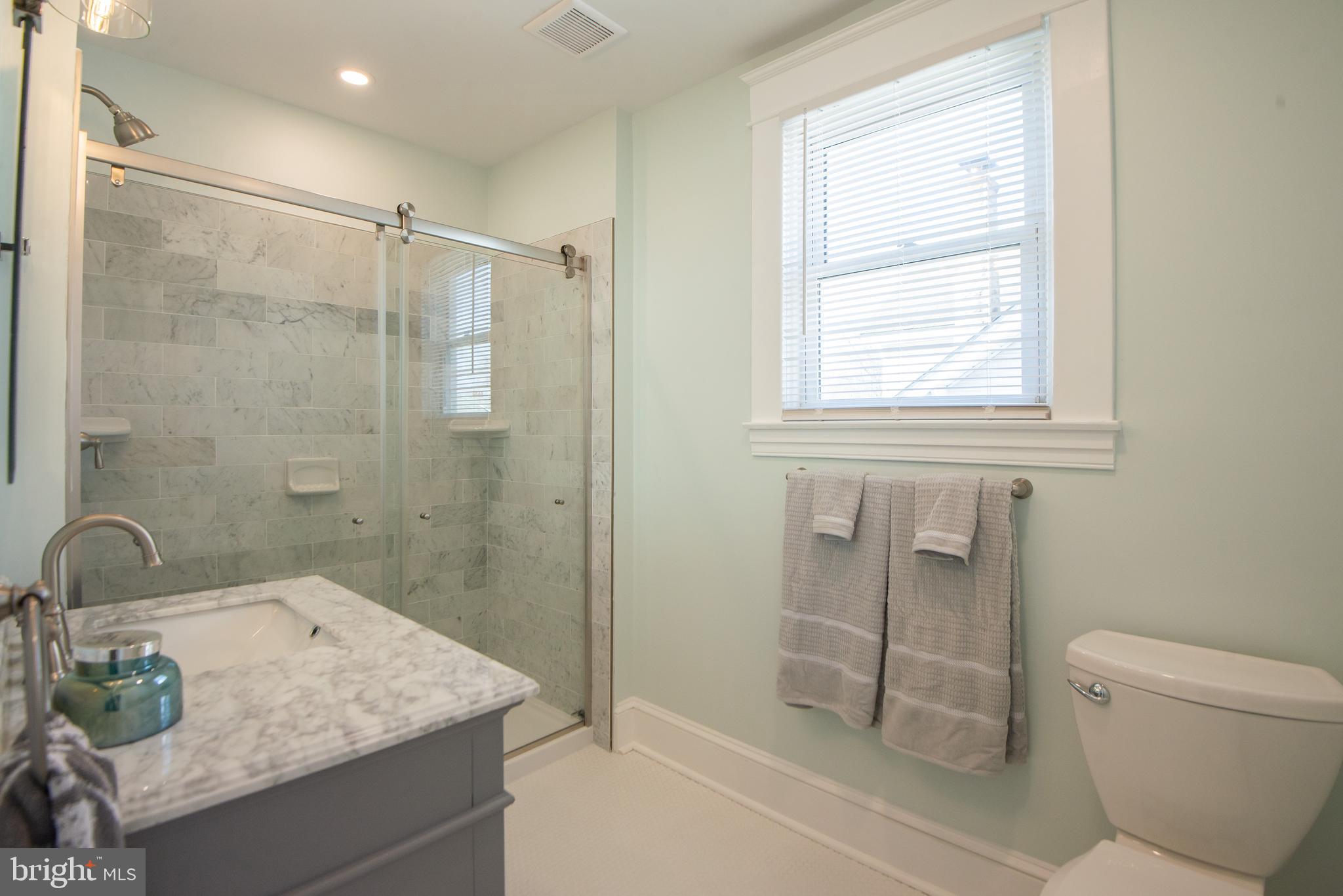 3323 Rueckert Avenue Baltimore, MD 21214 - Photo 15 of 27 Spacious & bright ensuite full bath off of MBR