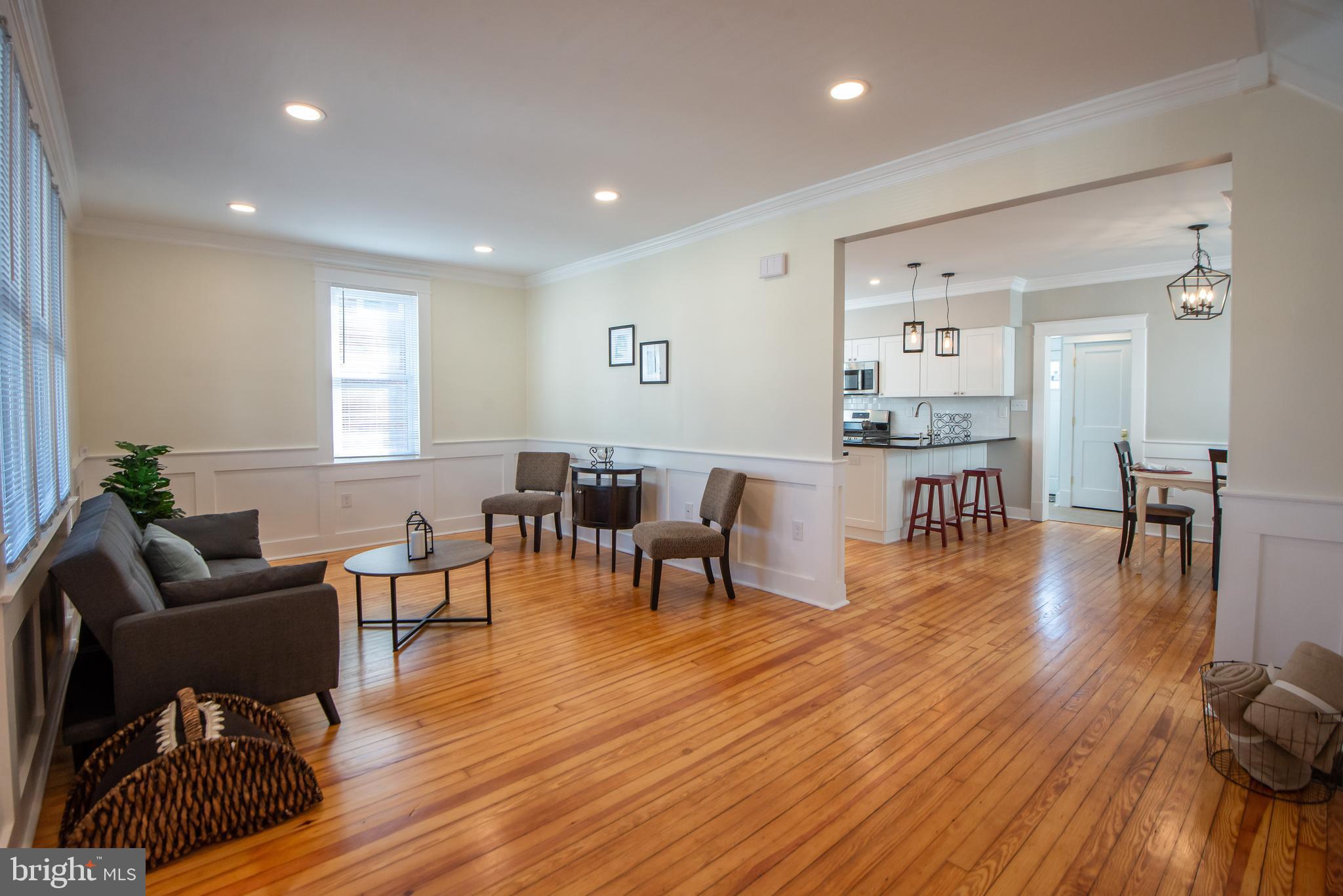 3323 Rueckert Avenue Baltimore, MD 21214 - Photo 3 of 27 Spacious open concept with hardwood thru-out