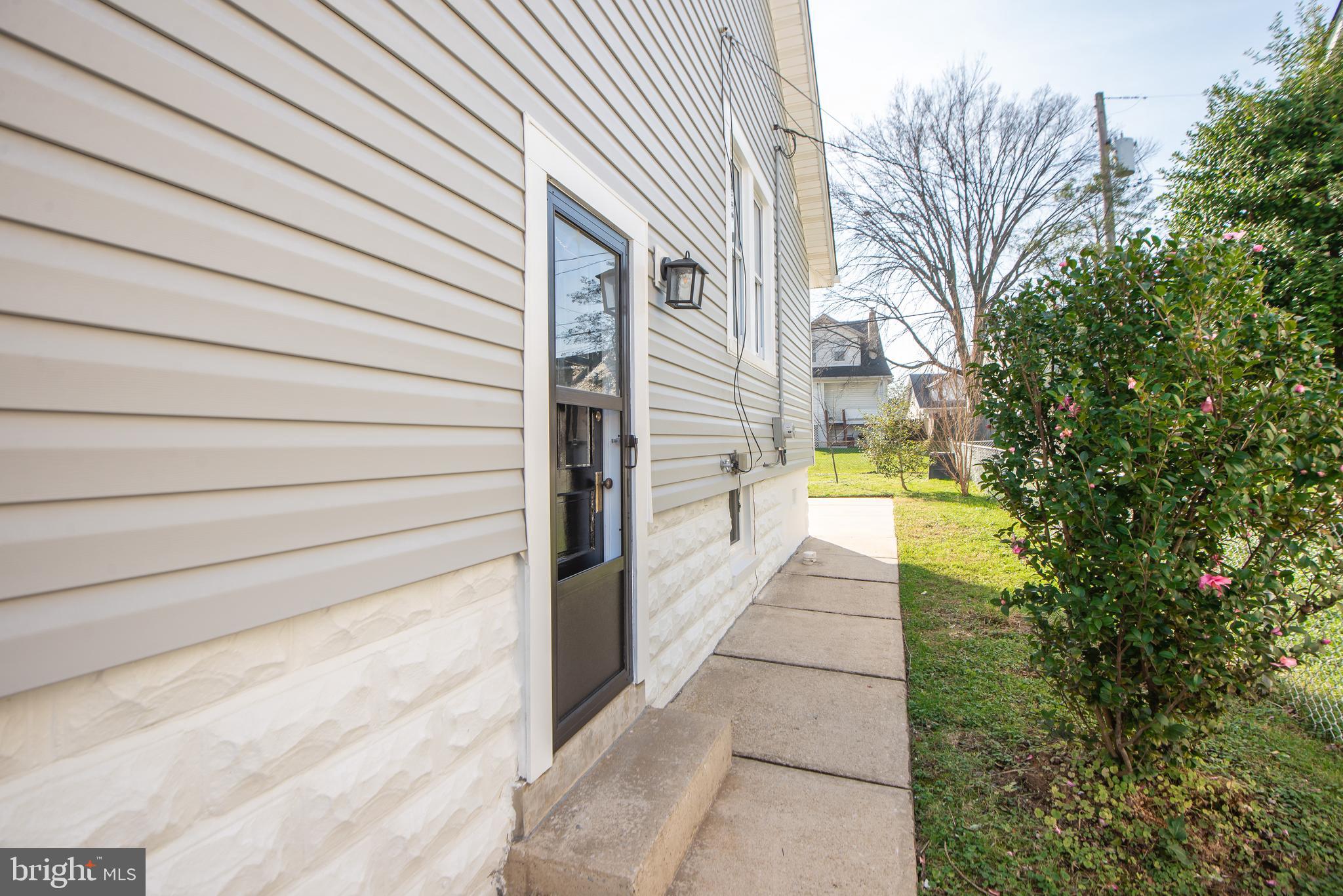 3323 Rueckert Avenue Baltimore, MD 21214 - Photo 21 of 27 side yard entry to LL