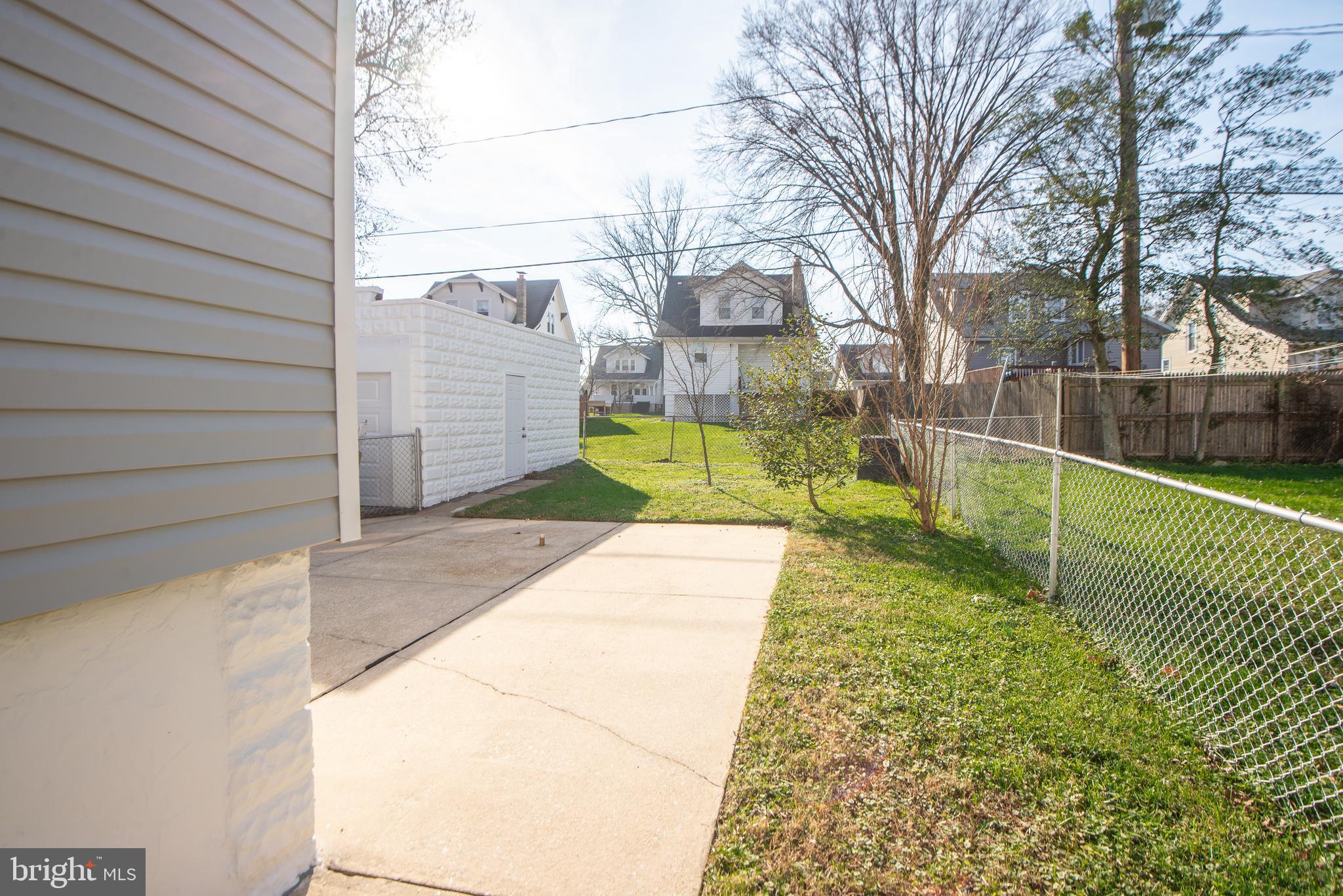 3323 Rueckert Avenue Baltimore, MD 21214 - Photo 22 of 27 rear of home w/ patio & detached garage