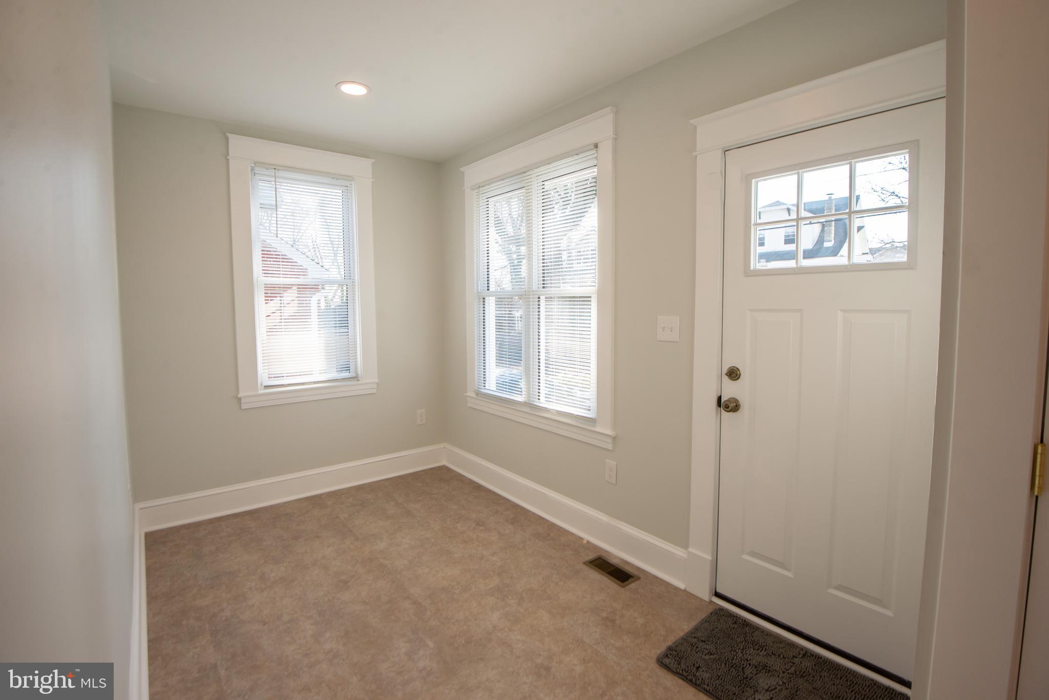 3323 Rueckert Avenue Baltimore, MD 21214 - Photo 9 of 27 rear entry mudroom with laundry rm & 1/2 bath