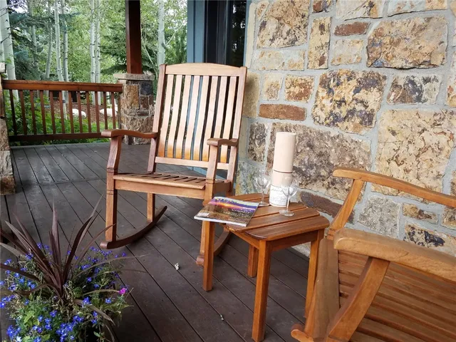 a view of a balcony with chairs