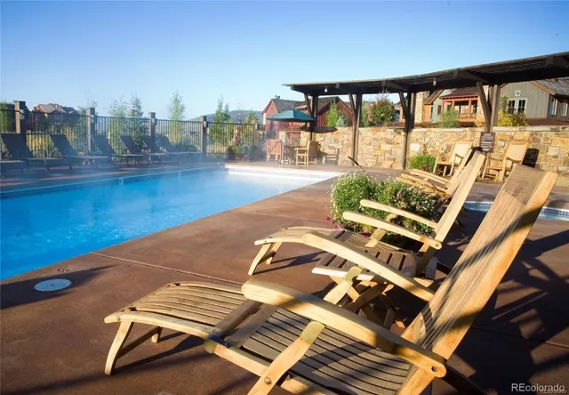 a view of a balcony with chairs