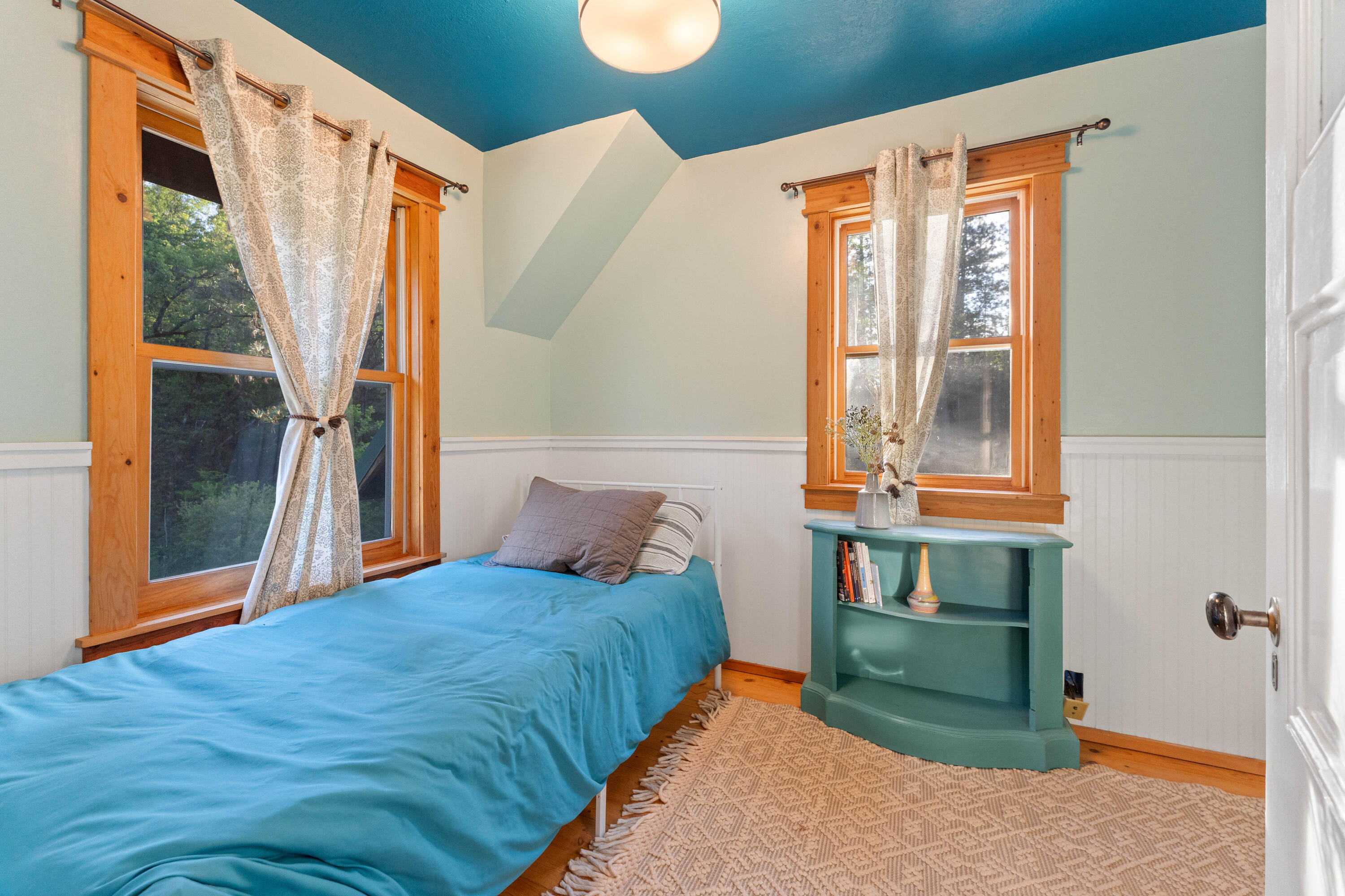 7704 Eastmoore Road Shingletown, CA 96088 - Photo 13 of 30 a bedroom with a bed and a window