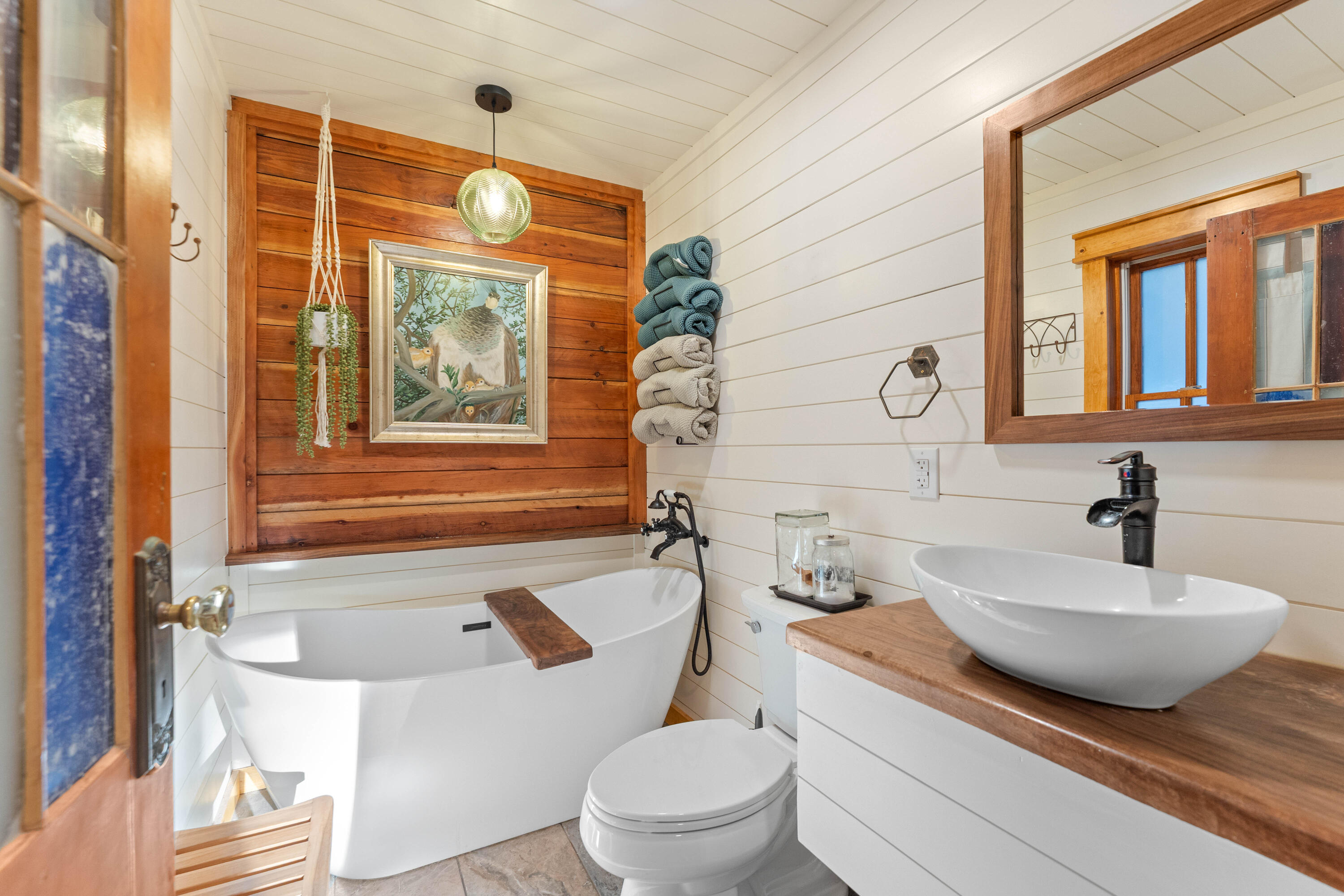 7704 Eastmoore Road Shingletown, CA 96088 - Photo 14 of 30 a bathroom with a granite countertop sink mirror vanity bathtub and a toilet