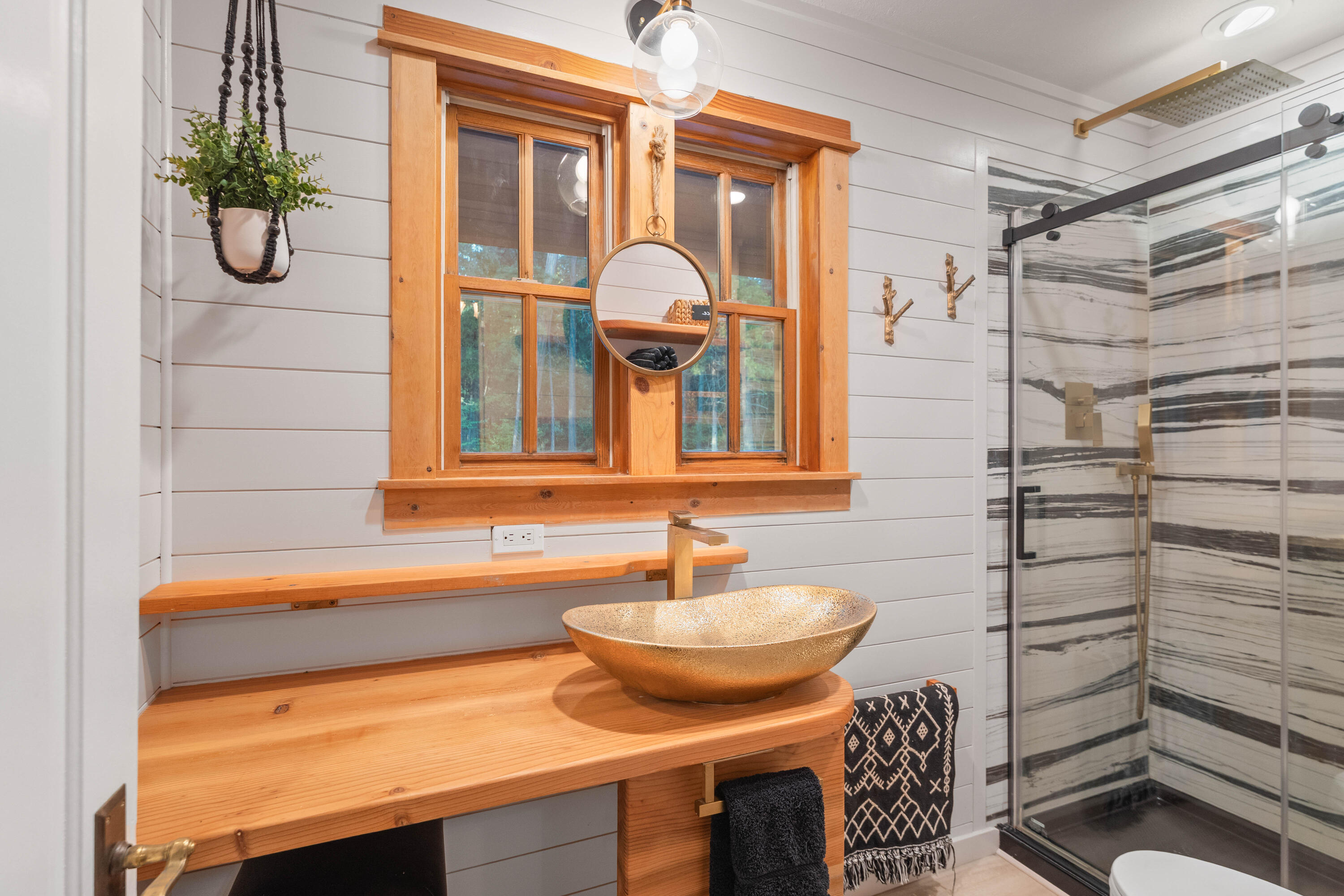 7704 Eastmoore Road Shingletown, CA 96088 - Photo 15 of 30 a bathroom with a sink and a mirror