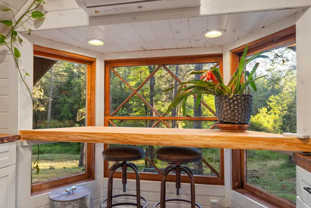 a view of a chairs and table in the patio