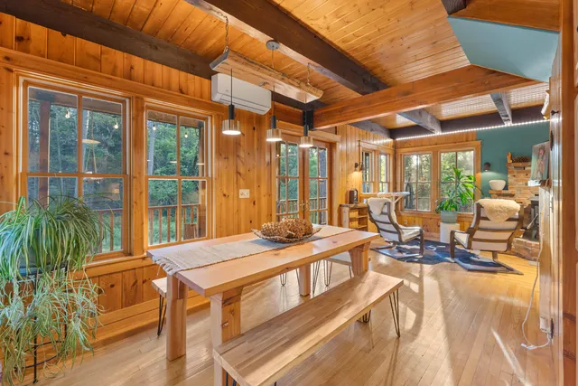 a outdoor space with lots of furniture and floor to ceiling window