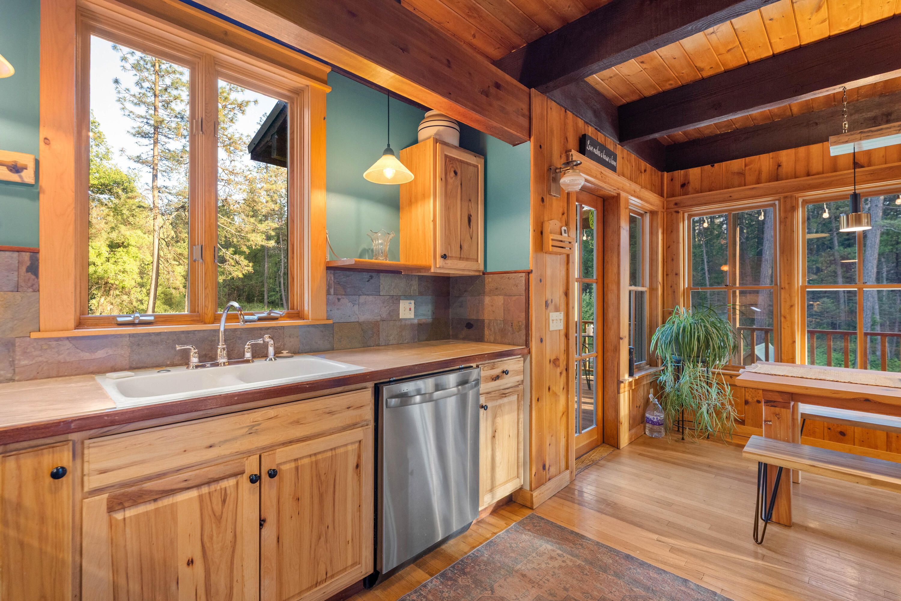 7704 Eastmoore Road Shingletown, CA 96088 - Photo 10 of 30 a kitchen with a sink and a large window