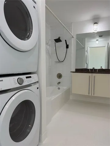 a view of a washer and dryer in a room