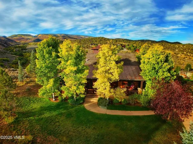 a view of a city with mountains in the background