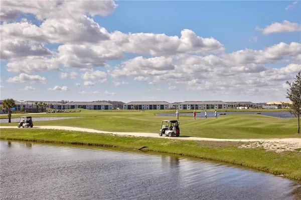 a view of a lake with a big yard