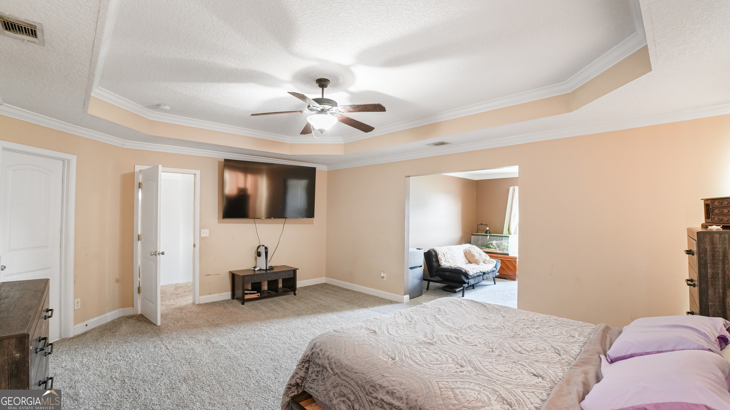 258 Nashview Trail Allenhurst, GA 31301 - Photo 25 of 40 a bedroom with a bed couch and a window