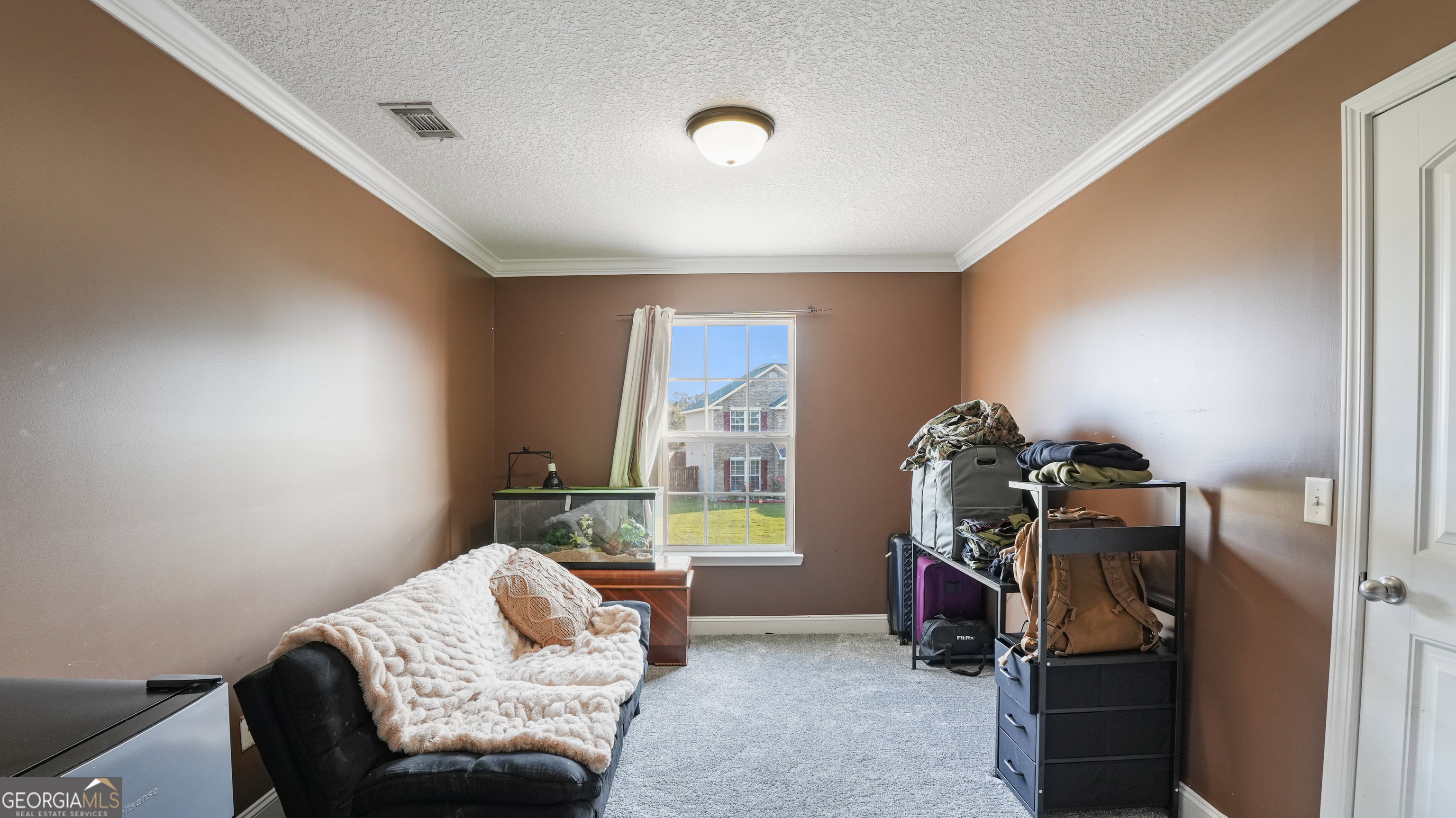 258 Nashview Trail Allenhurst, GA 31301 - Photo 26 of 40 a bedroom with furniture and a window