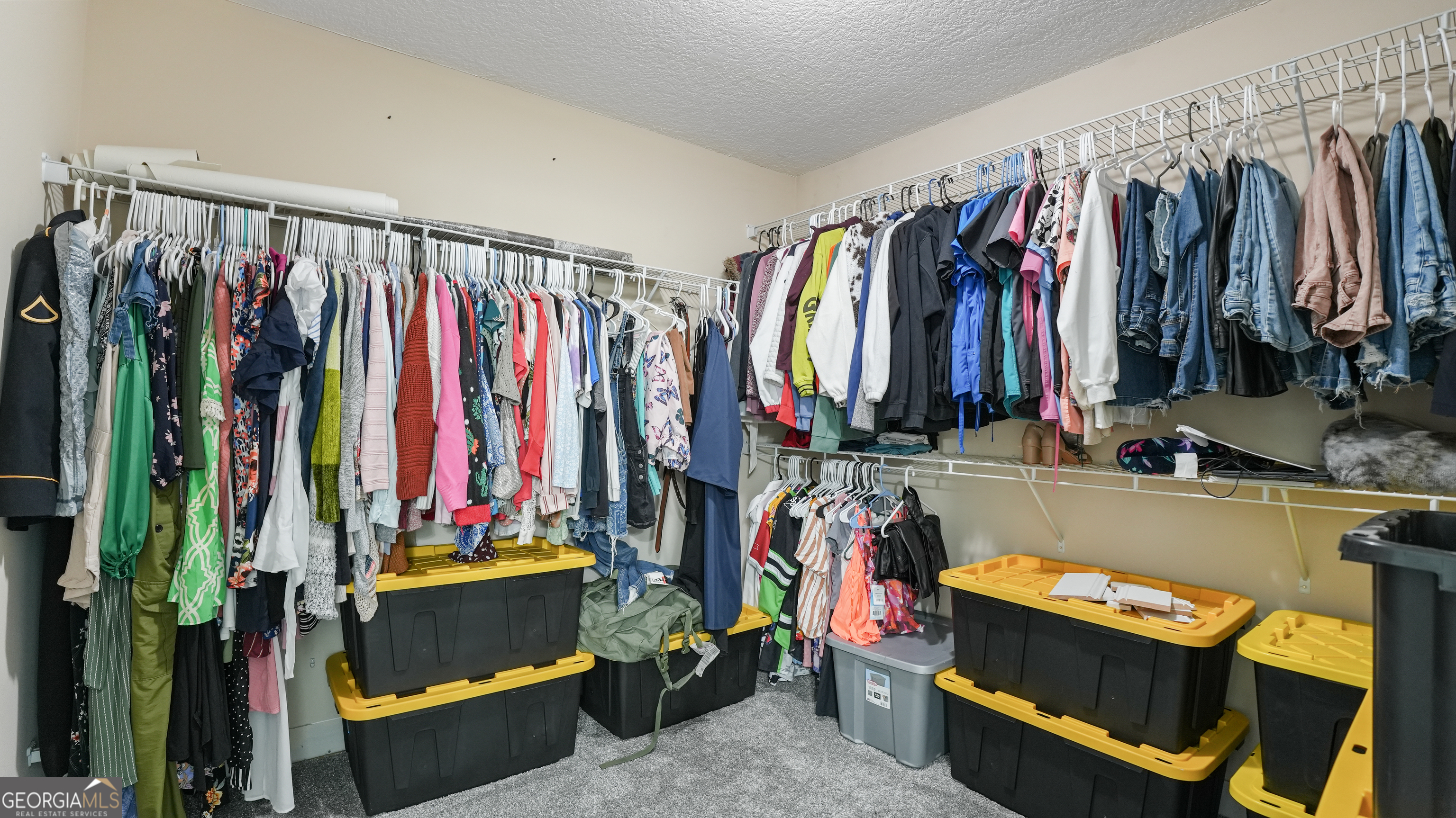 258 Nashview Trail Allenhurst, GA 31301 - Photo 29 of 40 a view of walk in closet with clothes