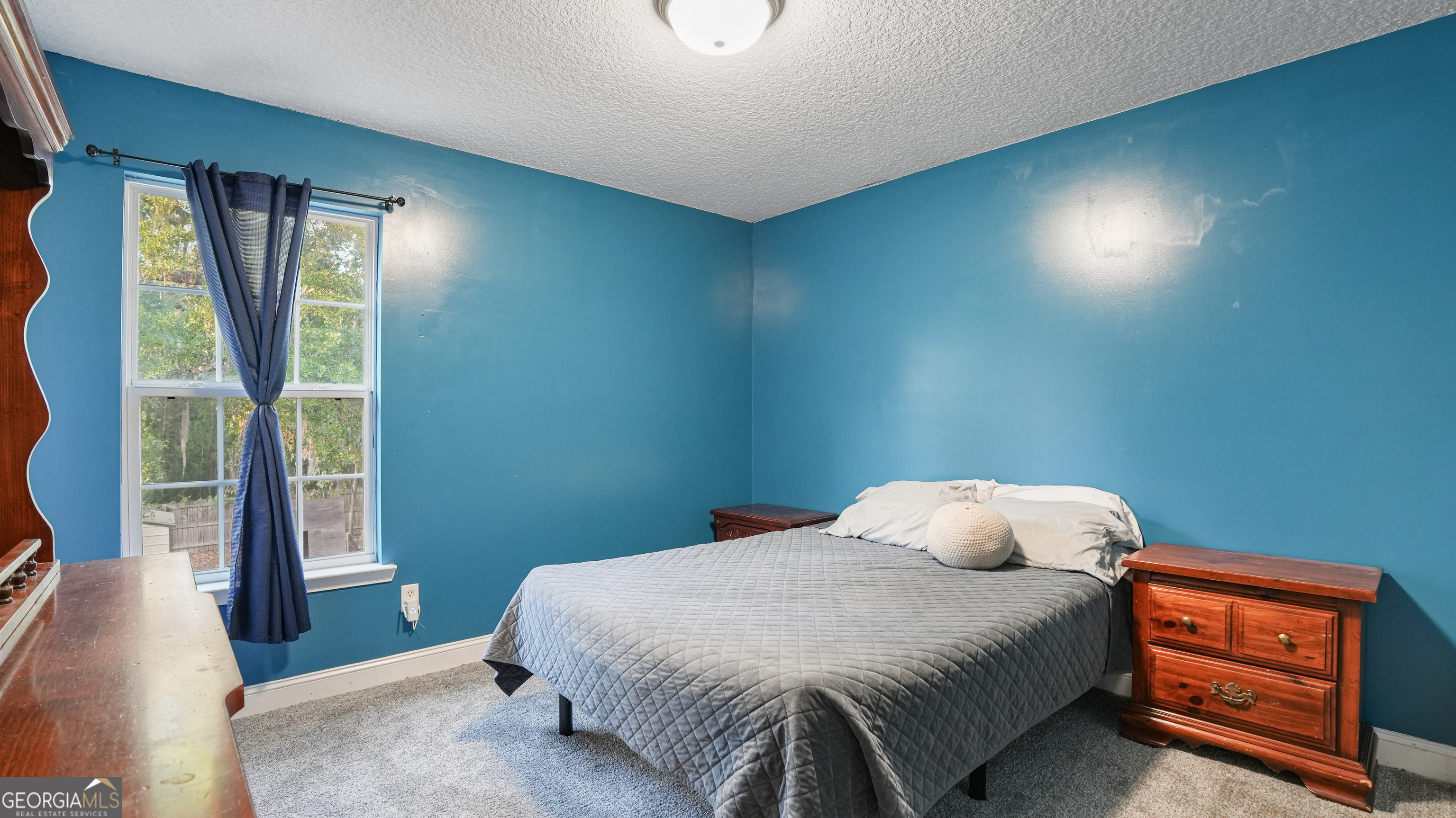 258 Nashview Trail Allenhurst, GA 31301 - Photo 35 of 40 a bedroom with a bed and window