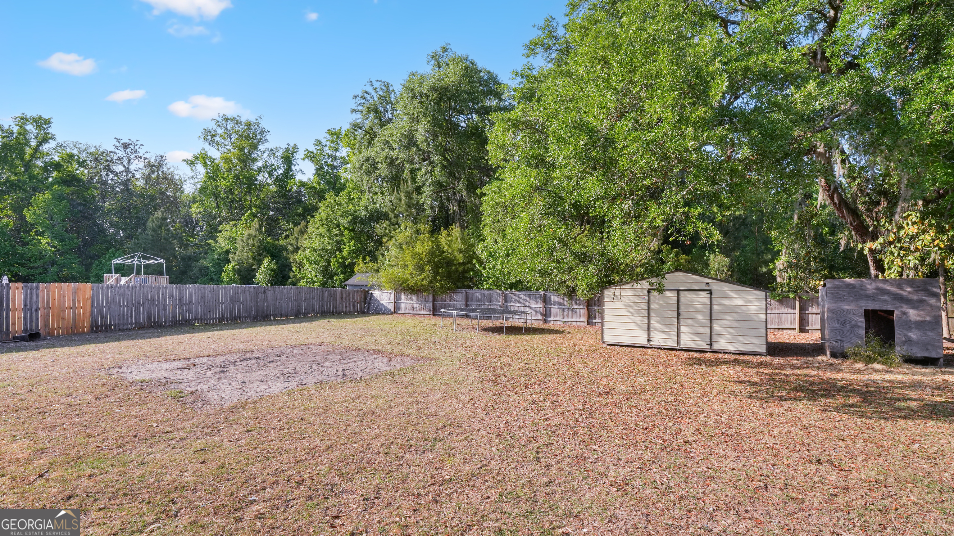 258 Nashview Trail Allenhurst, GA 31301 - Photo 38 of 40 a view of an house with backyard and a tree
