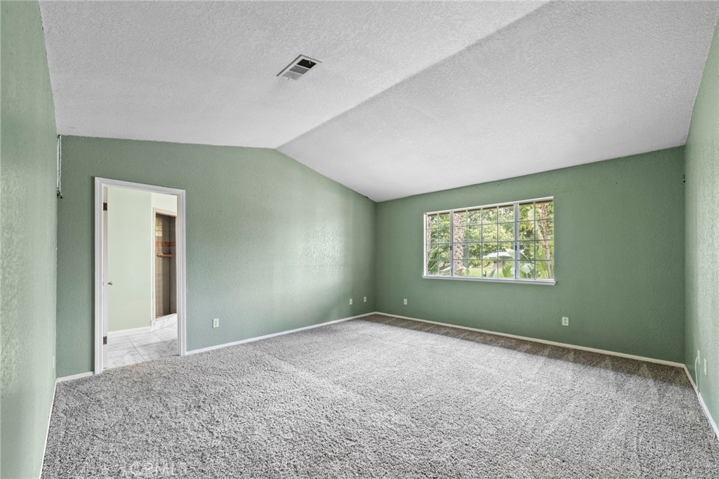 6770 Sandy Lane Riverside, CA 92505 - Photo 16 of 28 an empty room with windows