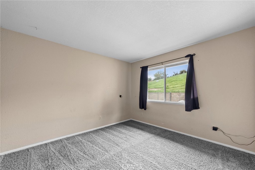 6770 Sandy Lane Riverside, CA 92505 - Photo 22 of 28 a view of an empty room with a window