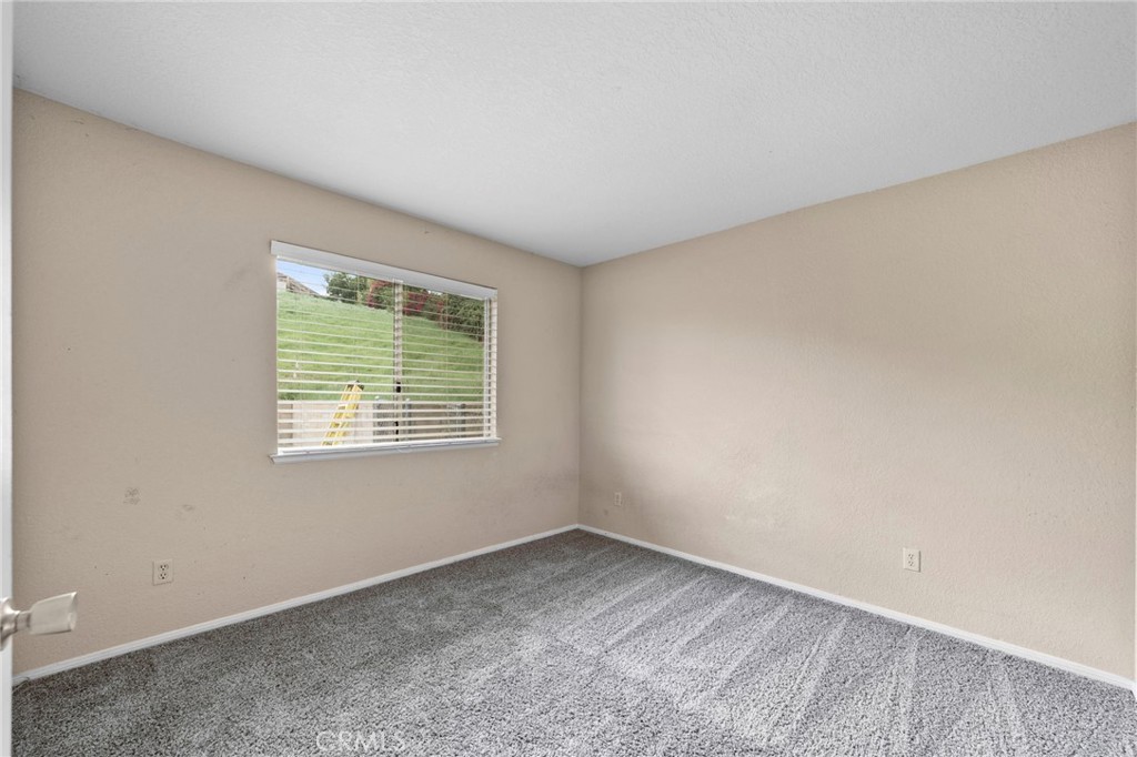 6770 Sandy Lane Riverside, CA 92505 - Photo 23 of 28 an empty room with a window
