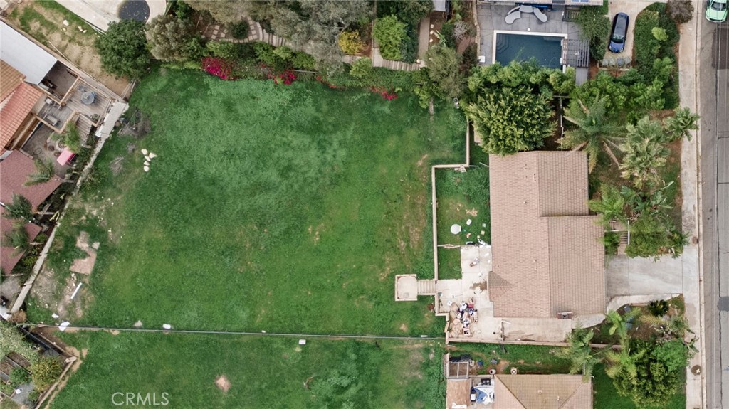 6770 Sandy Lane Riverside, CA 92505 - Photo 28 of 28 an aerial view of a house with a yard