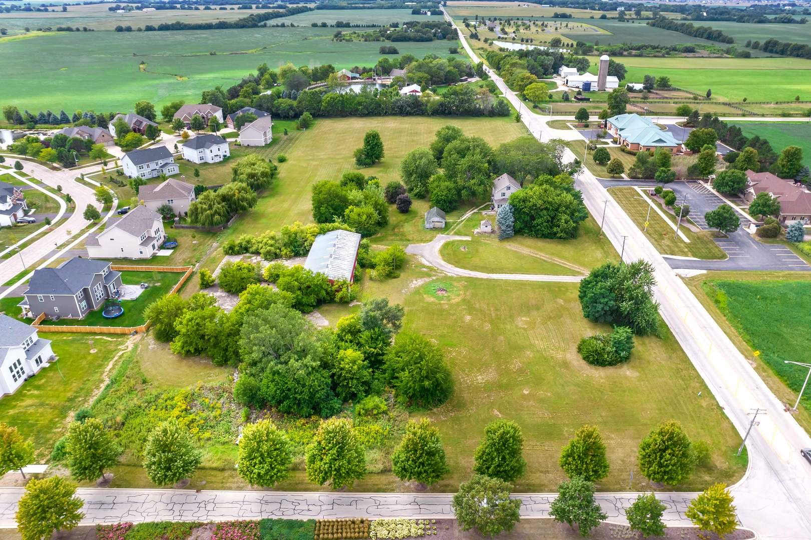 870 Simons Road Plainfield, IL 60585 - Photo 9 of 14 a view of a lake with a city