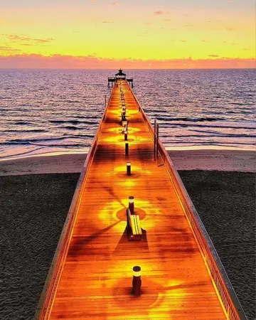 a view of a balcony with a yard