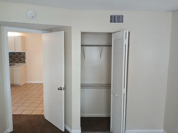 a bathroom with a shower and a toilet