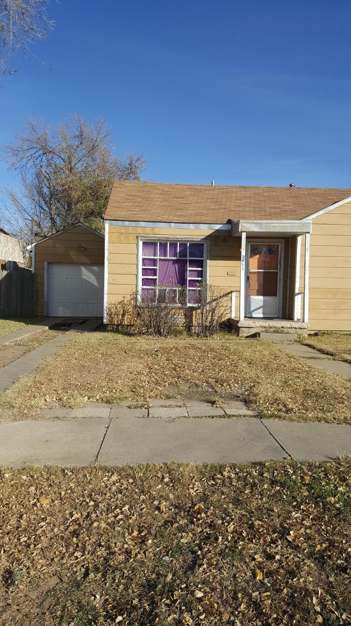 3811 South Tyler Street Amarillo, TX 79110 - Photo 2 of 10 a front view of house with yard