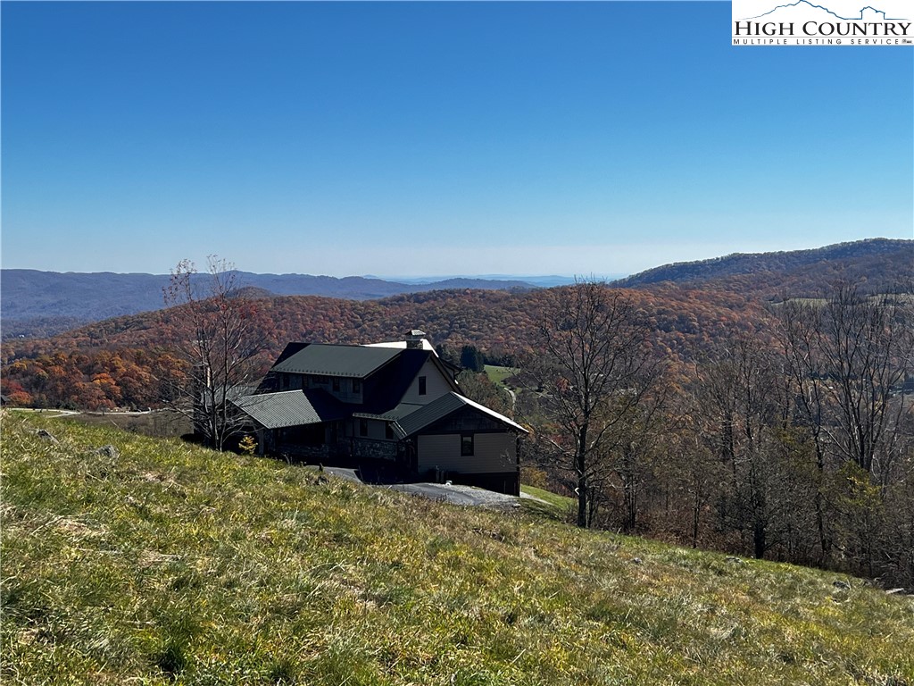 Site D Chappell Farm Road Banner Elk, NC 28604 - Photo 12 of 50 a view of a large mountain in the distance in a field