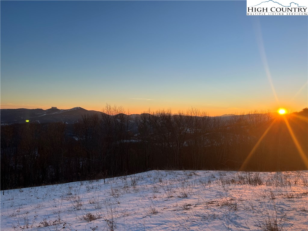 Site D Chappell Farm Road Banner Elk, NC 28604 - Photo 15 of 50 a view of wooden fence and a mountain view in back