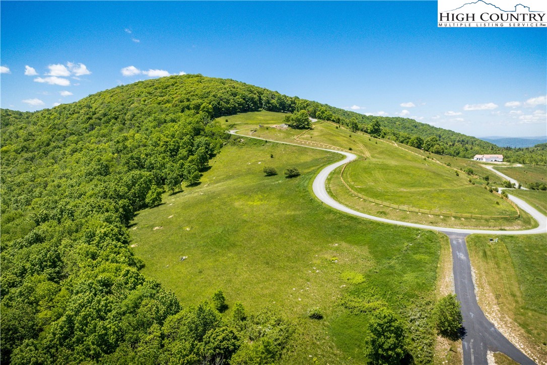 Site D Chappell Farm Road Banner Elk, NC 28604 - Photo 28 of 50 a view of a swimming pool with a yard