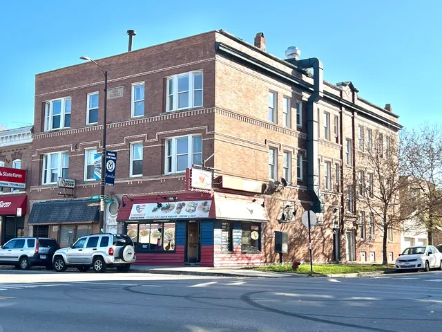 a front view of a building with street view