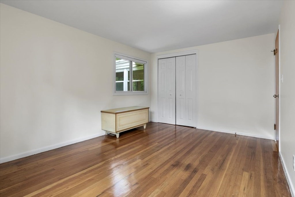 51 Joan Road Boston, MA 02136 - Photo 16 of 42 a view of a room with wooden floor and window