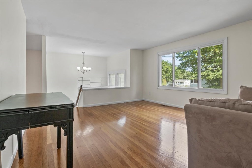 51 Joan Road Boston, MA 02136 - Photo 6 of 42 a view of a livingroom with furniture and window