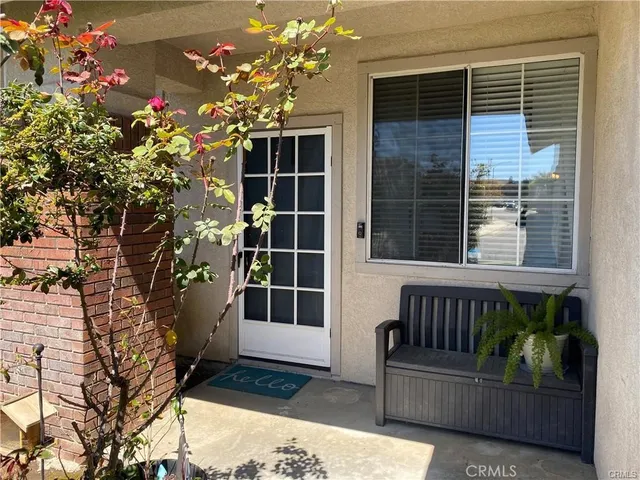 a view of a porch with a bench