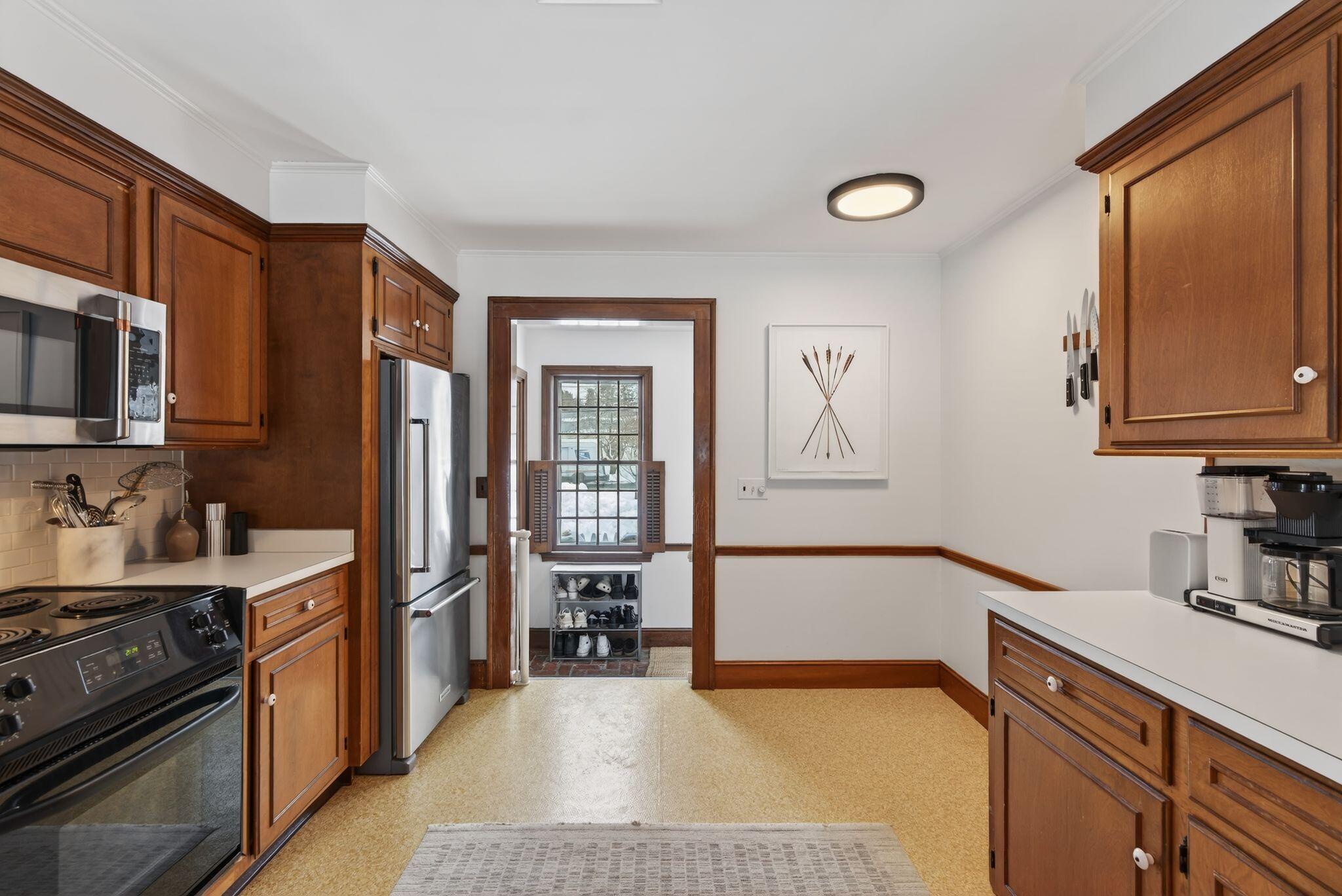 295 Ferry Road Saco, ME 04072 - Photo 17 of 47 Kitchen View into Mudroom