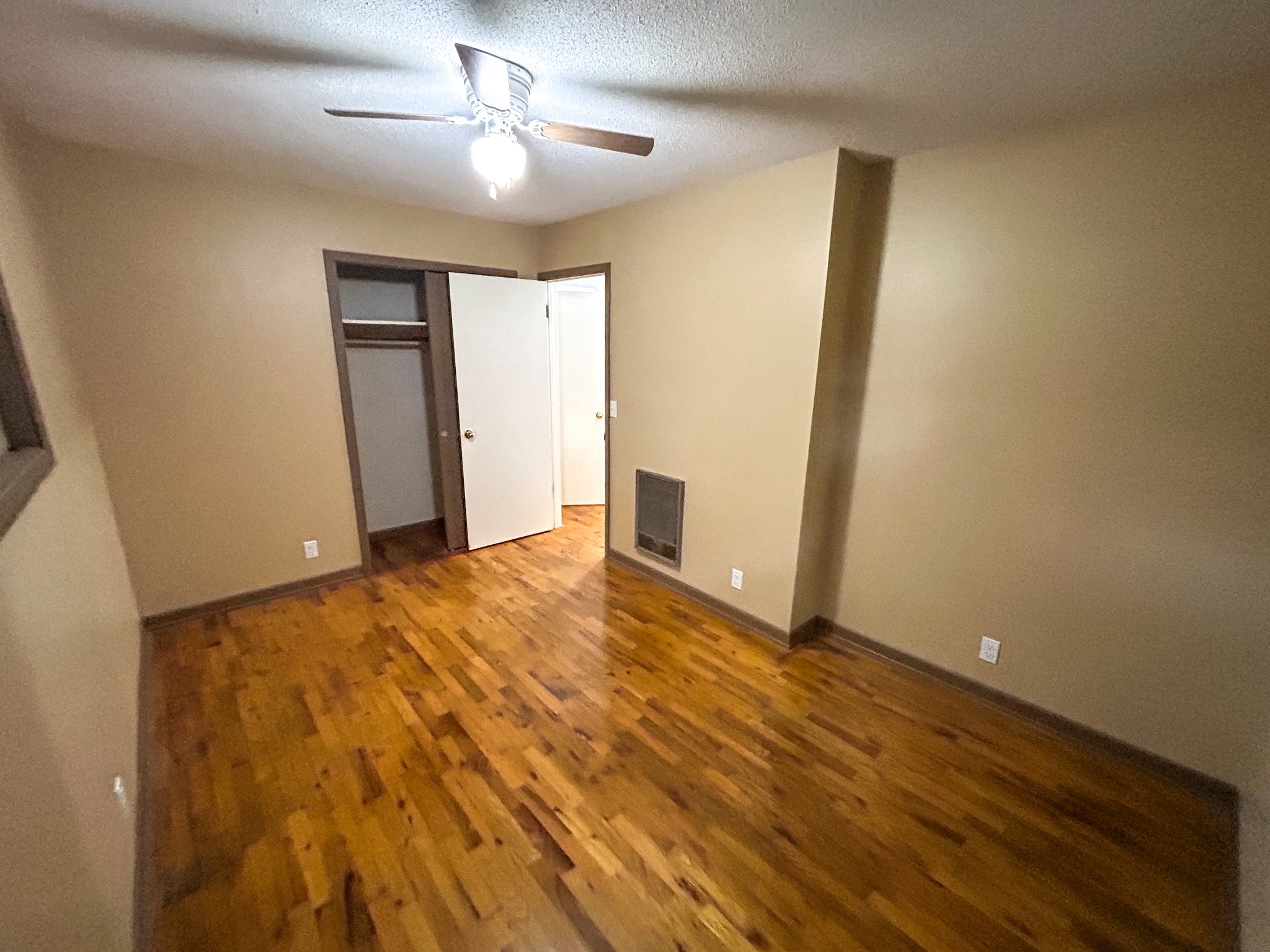 181 Jones Street Huntingdon, TN 38344 - Photo 16 of 21 a view of empty room with wooden floor