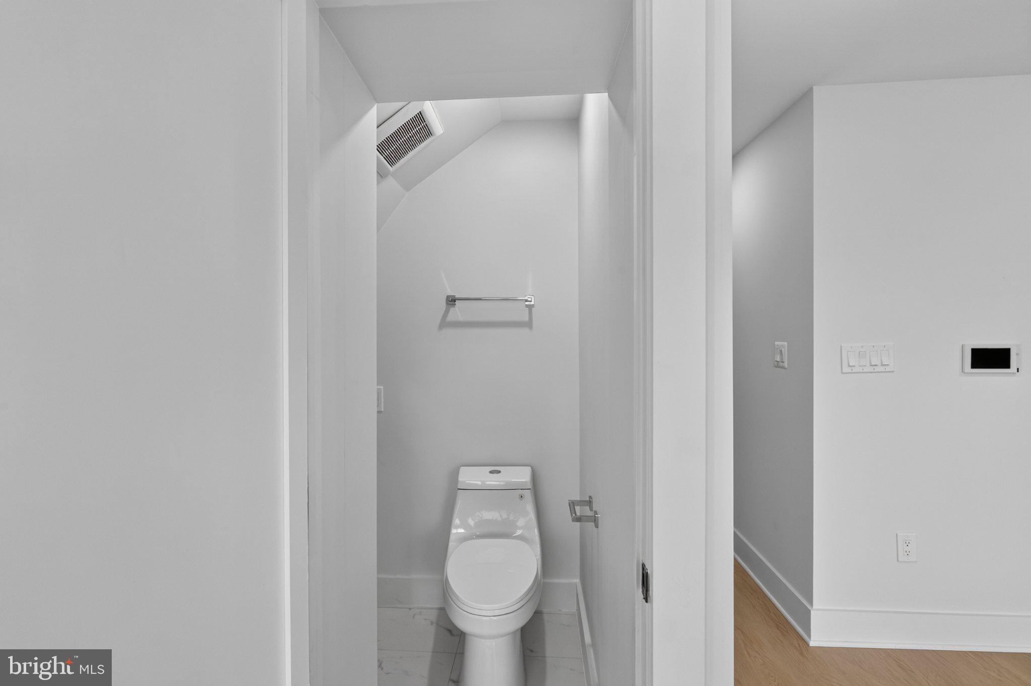 1650 Columbia Road Northwest, Unit 401 Washington, DC 20009 - Photo 8 of 21 Sleek, modern half-bath retreat.