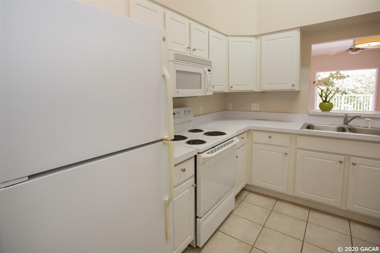 9158 Southwest 51st Road, Unit J302 Gainesville, FL 32608 - Photo 6 of 30