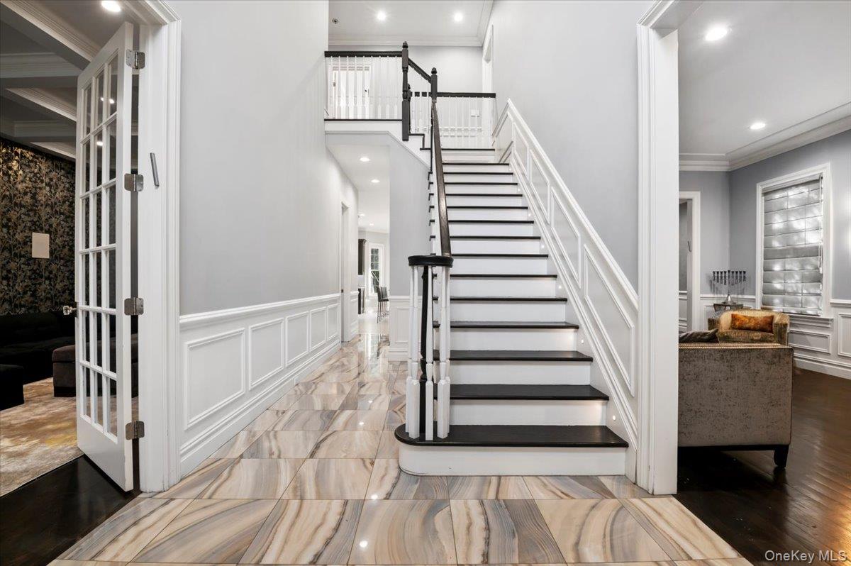 335 Summit Avenue Cedarhurst, NY 11516 - Photo 2 of 43 a view of entryway and hall with wooden floor