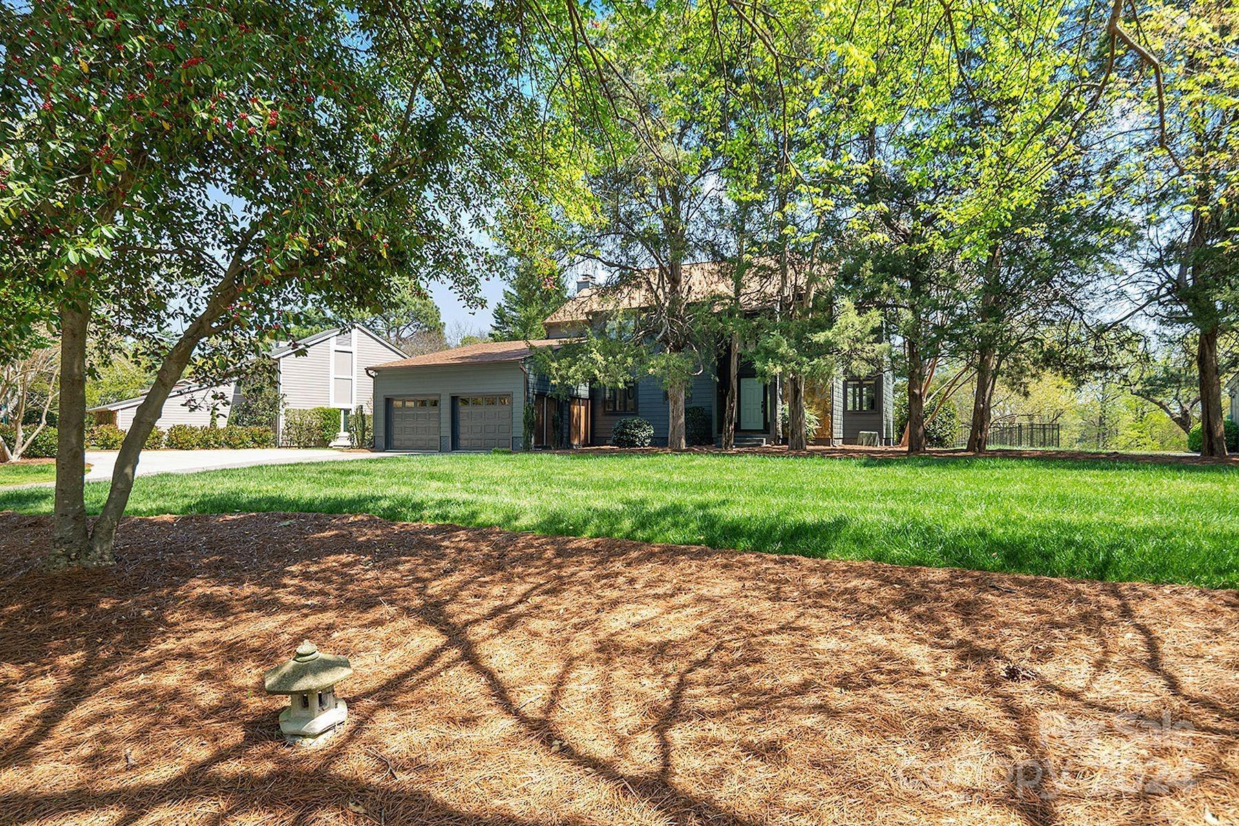 4201 Rounding Run Road Charlotte, NC 28277 - Photo 3 of 37 a view of a house with a yard