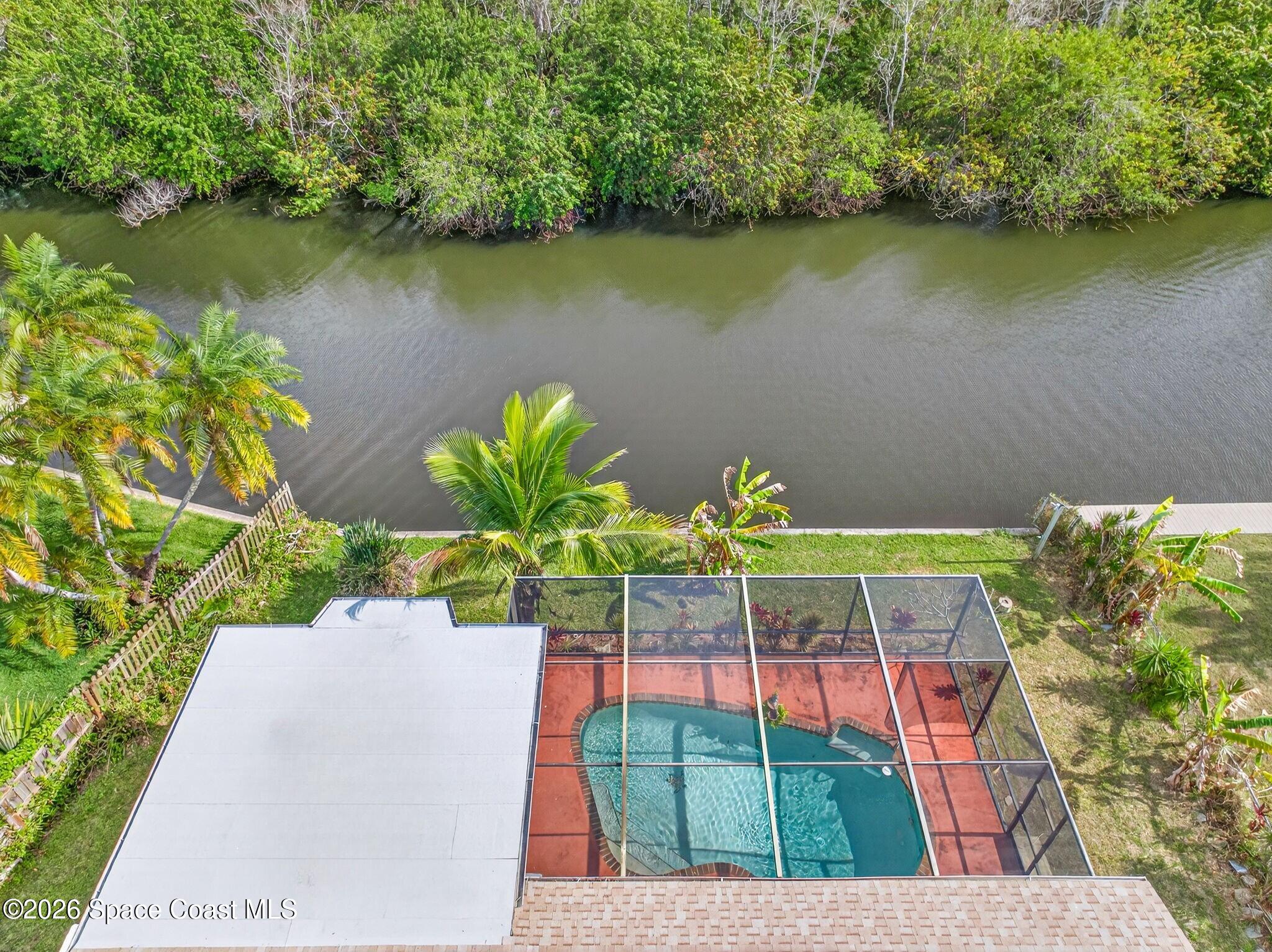 1081 Sunswept Road Northeast Palm Bay, FL 32905 - Photo 3 of 51 1081 sunswept back - Edited