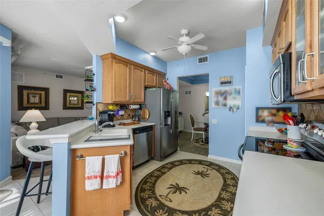 a very nice looking dining room with a large window