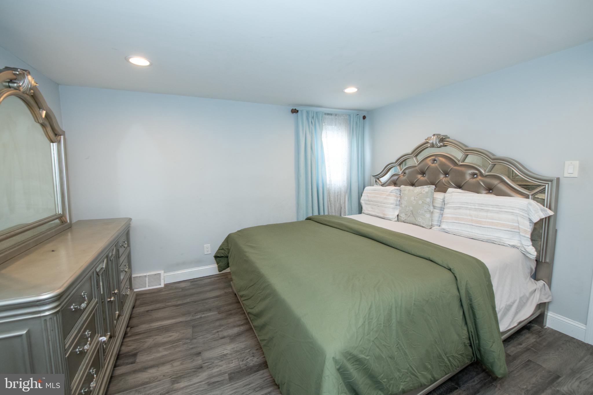 2849 Welsh Road Philadelphia, PA 19152 - Photo 12 of 36 Spacious Primary bedroom with elegant decor.