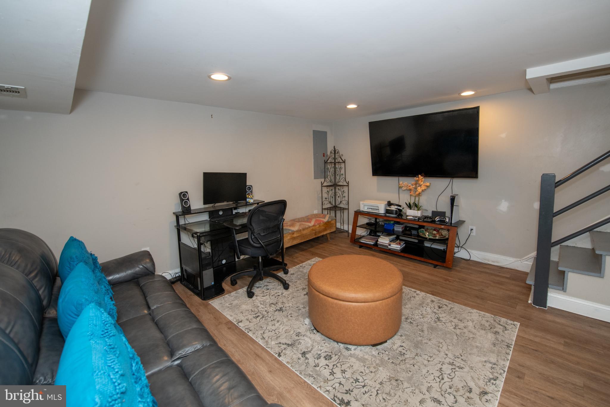 2849 Welsh Road Philadelphia, PA 19152 - Photo 22 of 36 Cozy basement retreat with modern touches.