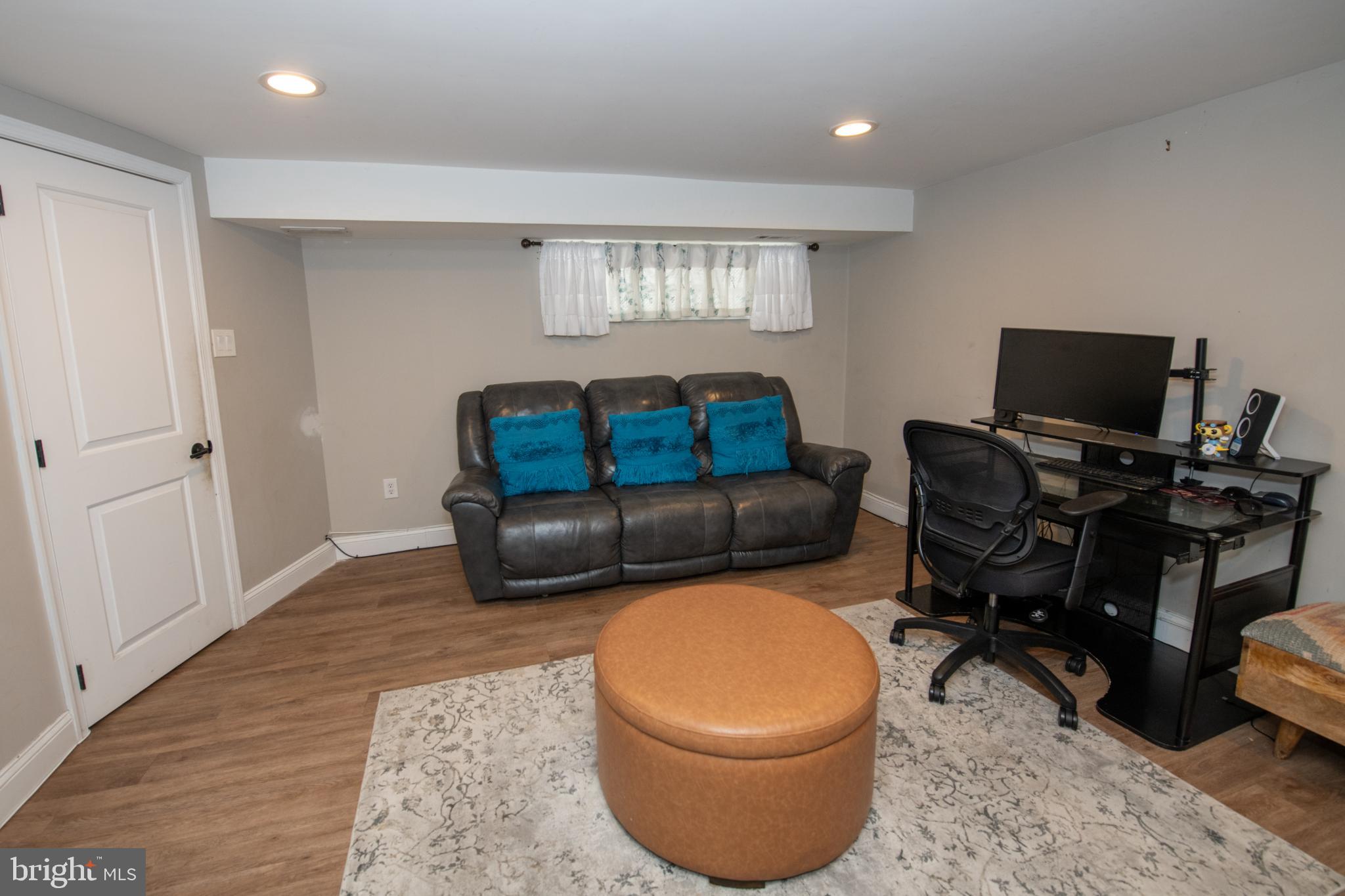 2849 Welsh Road Philadelphia, PA 19152 - Photo 24 of 36 Cozy basement retreat with modern touches.