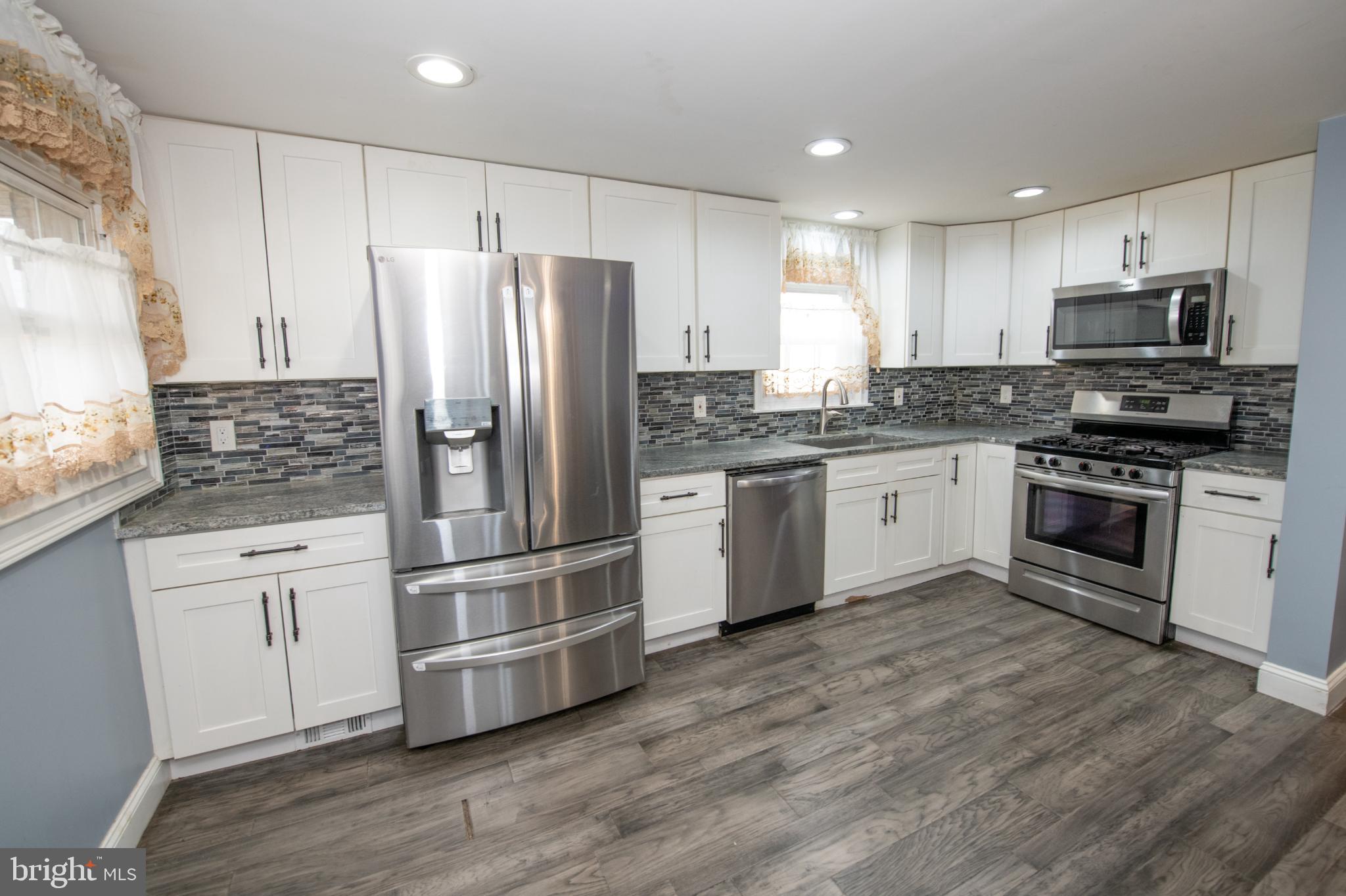 2849 Welsh Road Philadelphia, PA 19152 - Photo 7 of 36 Modern kitchen with sleek appliances.