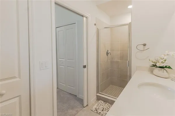 a bathroom with a bathtub and shower